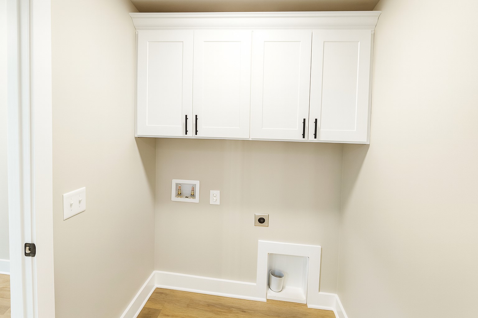The Adrian floor plan by Southaven Homes: laundry room